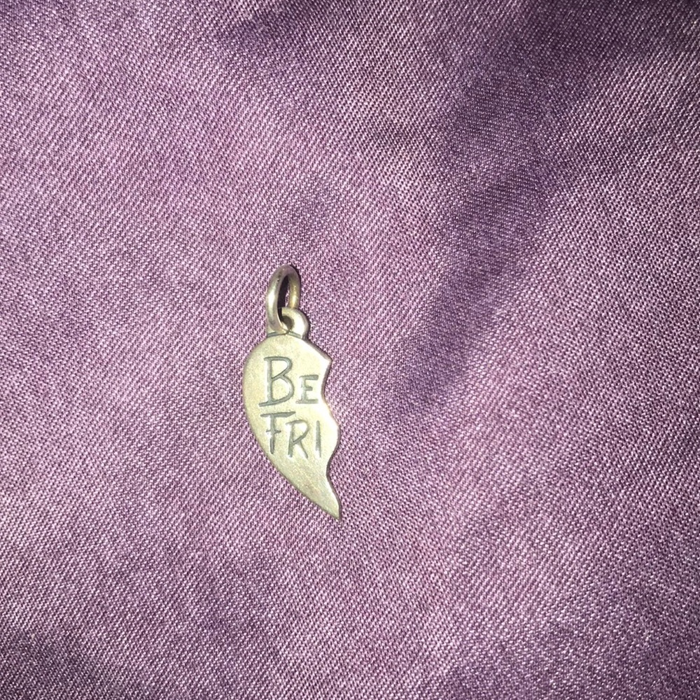 Half of best friends heart charm